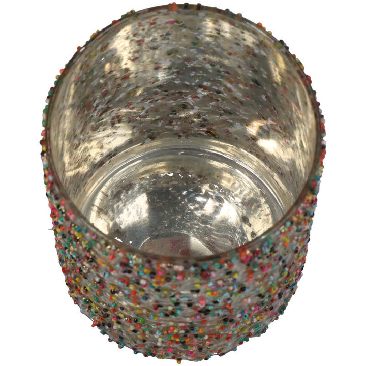 Waxinelichthouder van glas met gekleurde spikkels